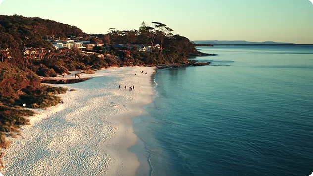 Landscape drone shot of bright white sand at Hyams Beach